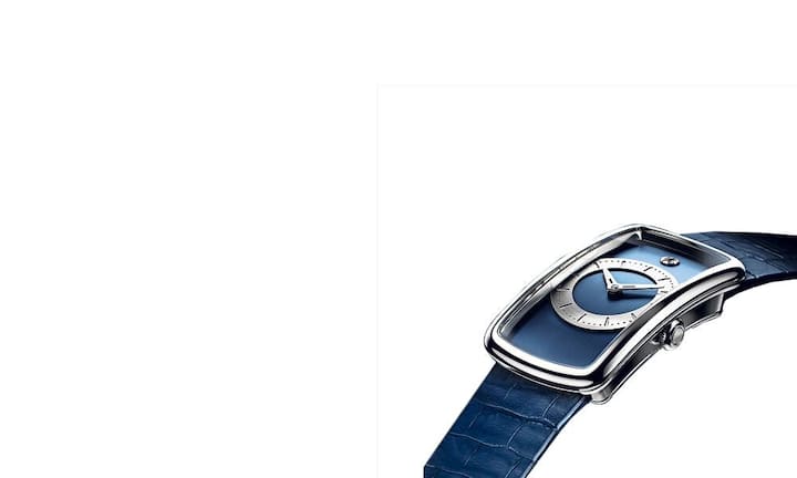 Hinter der scheinbar nüchternen Oberfläche verbirgt sich mit der Manufakturuhr Ivresse eine kompromisslose Persönlichkeit. Das rechteckige Gehäuse ist aus Platin. Das Spiel der Kontraste wird unterstrichen durch das gebürstete Zifferblatt unter einem satinierten Stundenkreis. Werk: Mechanisch mit Handaufzug, fliegendes Tourbillon, Gangreserve 120 Std. Gehäuse: Platin 30 x 53,80 mm Preis: Zirka 200 000 Franken