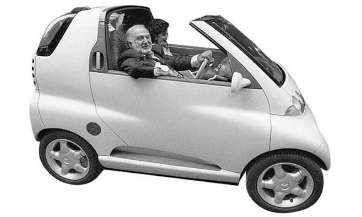 1990: Hayek lanciert die Idee des Swatchmobils, aus dem später der Smart wird.