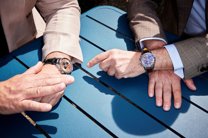 Präsident und CEO mit dem Breitling-Parademodell Navitimer.