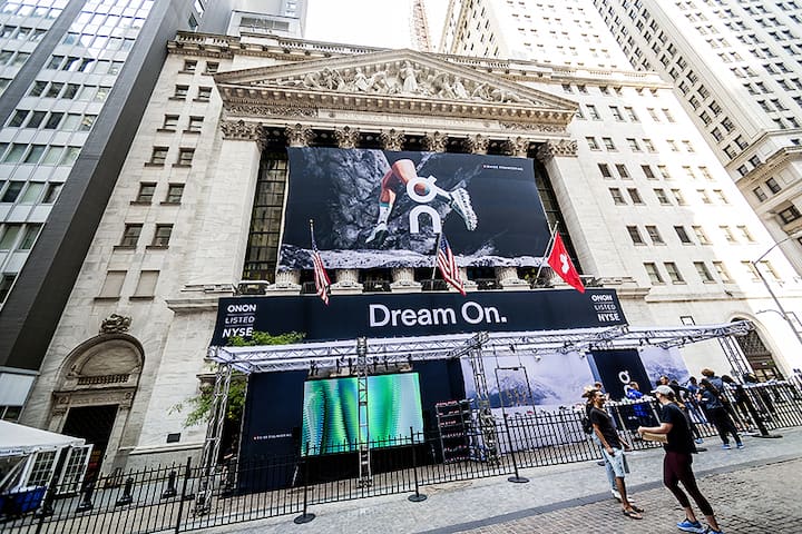 The facade of the New York Stock Exchange is decorated for the initial public offering of On Holdings, the sneaker manufacturer, on Wednesday, September 15, 2021. Roger Federer is reported to be an investor in the company. (Â© Richard B. Levine)