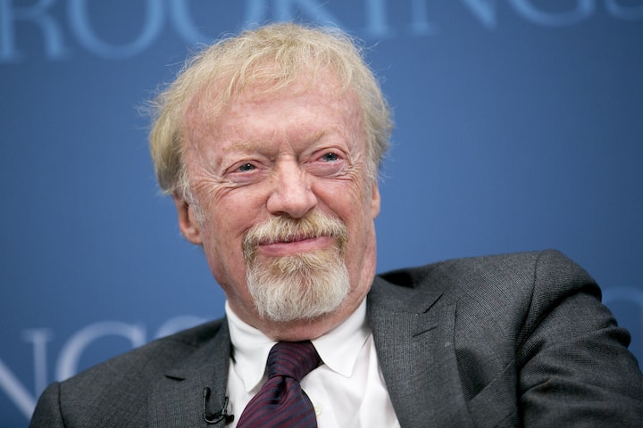 Philip Phil Knight, chairman and co-founder of Nike Inc., laughs during a panel discussion at the Brookings Institution in Washington, D.C., U.S., on Tuesday, Jan. 15, 2013. The event was titled Fostering Growth Through Innovation. Photographer: Andrew Harrer/Bloomberg *** Local Caption *** Phil Knight