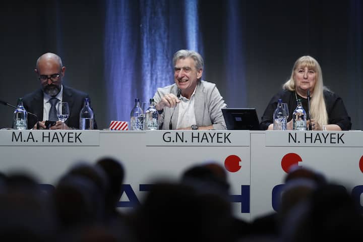 Marc Alexander Hayek, member of the management board, Nick Hayek, CEO and Nayla Hayek, chairwoman of the board of directors, from left, during the ordinary general meeting of shareholders of Swatch Group at the Tissot Velodrome, in Grenchen, Switzerland, Thursday, May 23, 2019. (KEYSTONE/Peter Klaunzer)
