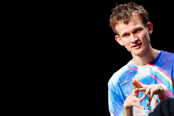 Russian-Canadian programmer Vitalik Buterin, founder and inventor of the Ethereum mining network and software development platform, along with the associated Ether (ETH) cryptocurrency, speaks at a blockchain event in Zug, Switzerland, Friday, July 6, 2018. (KEYSTONE/ Valentin Flauraud)