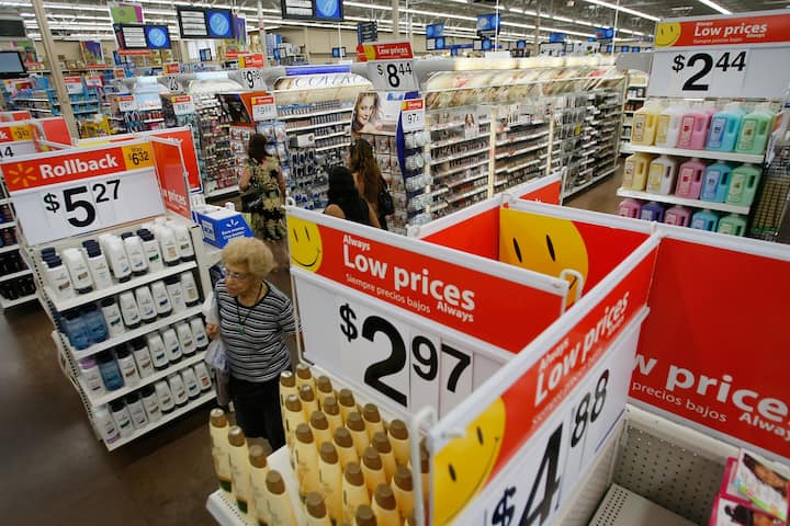 NORTH MIAMI, FL - AUGUST 14:  People shop at a Wal-Mart Store August 14, 2008 in North Miami, Florida. The company reported its second-quarter profit rose 17% and it raised its full-year forecast.  (Photo by Joe Raedle/Getty Images)