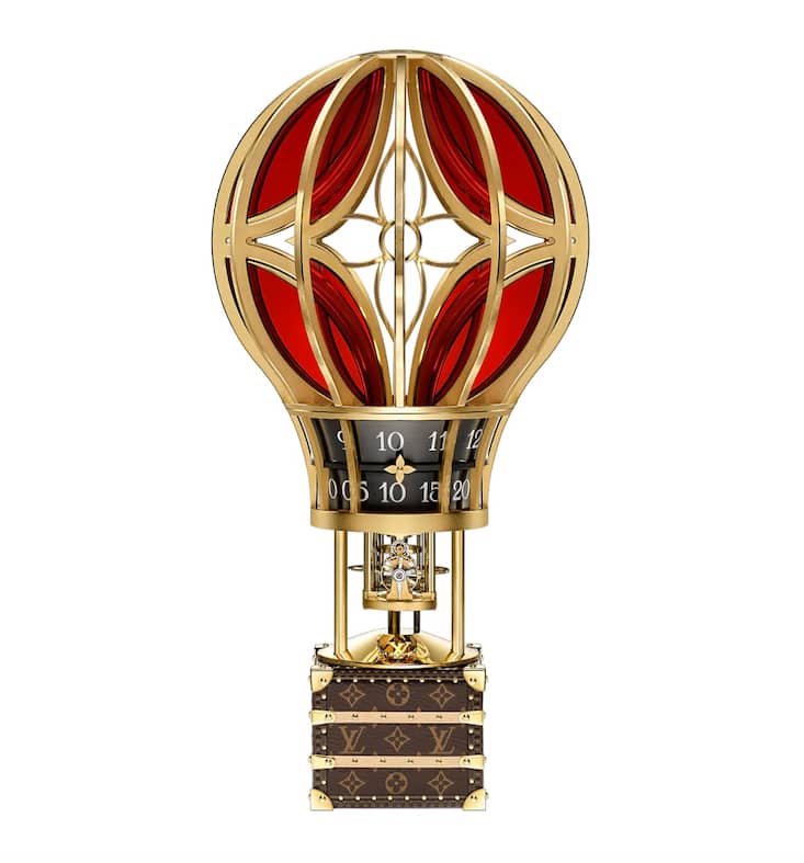 Tischuhr Montgolfière Aéro: Ein Heissluftballon transportiert den kleinsten jemals von Louis Vuitton gestalteten Koffer, in dem ein mechanisches Uhrwerk arbeitet.
