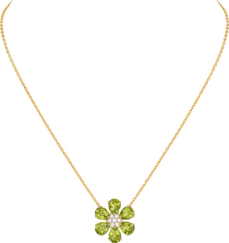 <p>Anhänger aus der Linie «Fleurs d’Hawaï» in Gelbgold mit Diamanten und Peridot. 15’800 Franken.</p>