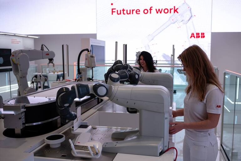 epa07476442 A robot at the fair stand of the company 'ABB' at the Hannover Industry Fair (Hannover Messe) in Hanover, Germany, 31 March 2019. From 01 April to 05 April, 6,500 exhibitors from 75 countries show their products during one of the World's leading fairs for industrial goods. Main focus of the Hannover Messe 2019 is on Artificial Intelligence and the new mobile standard 5G. EPA/JENS SCHLUETER
