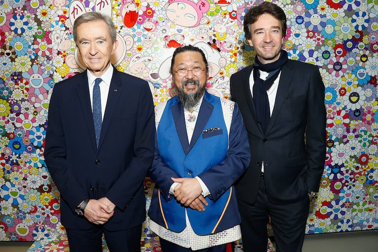 PARIS, FRANCE - APRIL 09:  (L-R) Owner of LVMH Luxury Group and President of the Louis Vuitton Foundation, Bernard Arnault, Japanese Artist Takashi Murakami and General manager of Berluti Antoine Arnault attend "Au Diapason Du Monde" Exhibition at Fondation Louis Vuitton on April 9, 2018 in Paris, France.  (Photo by Julien M. Hekimian/Getty Images)