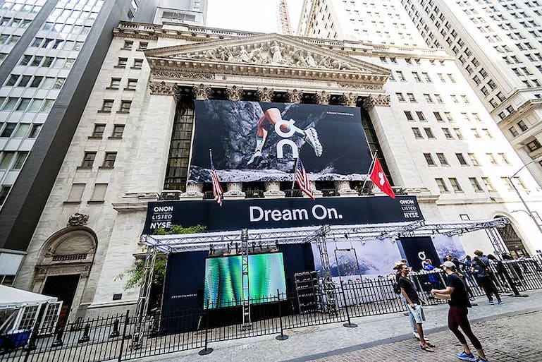 The facade of the New York Stock Exchange is decorated for the initial public offering of On Holdings, the sneaker manufacturer, on Wednesday, September 15, 2021. Roger Federer is reported to be an investor in the company. (Â© Richard B. Levine)