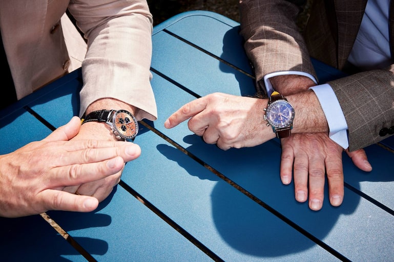 Präsident und CEO mit dem Breitling-Parademodell Navitimer.